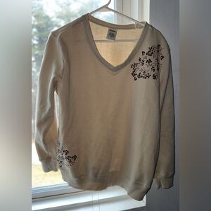 Blair Cream V-Neck Sweater with Dark Floral Accents
Vintage vintage